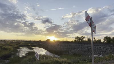 Sundown by the Railroad Tracks