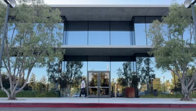 Glass Building, Workers going  in and out